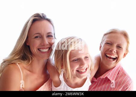 Momenti di gioia insieme. Ritratto di una donna attraente che trascorre il tempo con la figlia e la madre anziana. Foto Stock