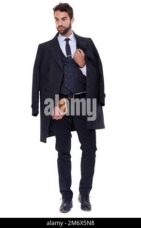 Se il dapper avesse una definizione... scatto a lunghezza intera di un giovane ben vestito su uno sfondo bianco. Foto Stock