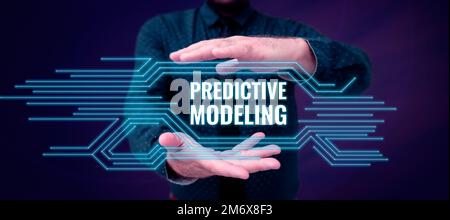 Scrittura con visualizzazione del testo Predictive Modeling (modellazione predittiva). Parola scritta sulla strategia di manutenzione basata sull'analisi predittiva Foto Stock
