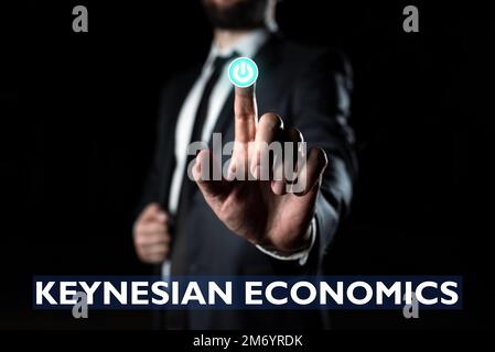 Scrittura con testo in economia keynesiana. Foto concettuale programmi monetari e fiscali da parte del governo per aumentare l'occupazione Foto Stock