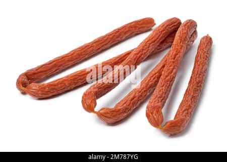 Le tradizionali salsicce Cabanossi si chiudono per uno spuntino isolato su sfondo bianco Foto Stock