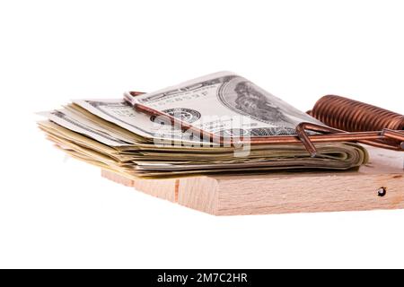 Banconote in dollari in una trappola di mousetrap, dept, USA Foto Stock