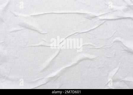 Grana carta bianca bagnata stropicciata con pieghe. carta da scrittura Foto Stock