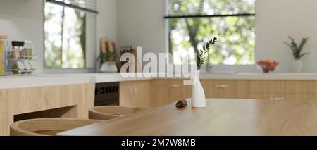 Immagine ravvicinata, Copia spazio su tavolo da pranzo in legno con vaso di fiori in legno scandinavo e cucina bianca stile interno. rappresentazione 3d, illustrazione 3d Foto Stock