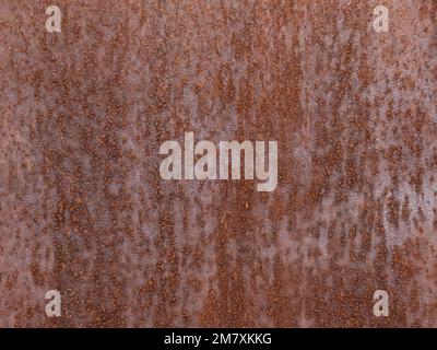 Primo piano della superficie del metallo arrugginito come sfondo Foto Stock