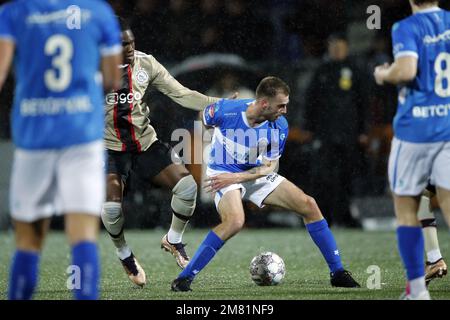 DEN BOSCH - (lr) Calvin Bassey di Ajax, Danny Verbeek di FC Den Bosch durante il 2nd° round della Toto KNVB Cup tra FC Den Bosch e Ajax allo Stadion De Vliert il 11 gennaio 2023 a Den Bosch, Paesi Bassi. ANP BART STOUTJESDYK Foto Stock