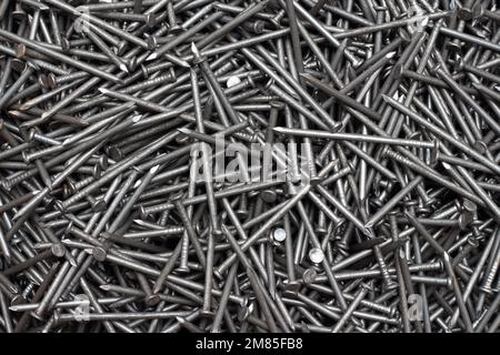 primo piano di sfondo unghie di ferro Foto Stock