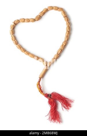 perline di preghiera in legno, opere d'api utilizzate per contare le ripetizioni delle preghiere, spesso utilizzate dai musulmani per tasbih o dhikr, isolate su sfondo bianco Foto Stock
