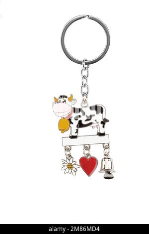 Portachiavi di varie forme, figure su sfondo bianco. Regalo per Natale, Pasqua, San Valentino, Vacanza Foto Stock