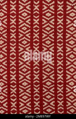 motivo geometrico di un tessuto bianco e rosso Foto Stock