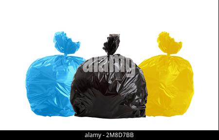 Tre sacchetti di rifiuti, non riciclabili, plastica e carta. Foto Stock
