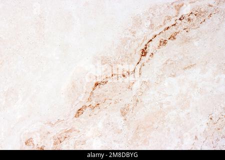Sfondo in pietra testurizzata in marmo beige chiaro. Texture marmorizzata marrone grunge monocromatica. Foto Stock