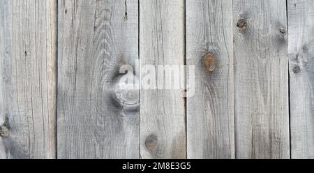 Vecchie tavole di legno grigio come sfondo rustico testurizzato con spazio copia. Foto Stock