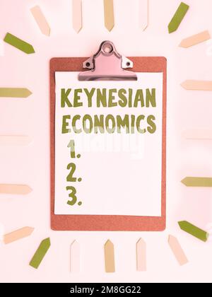 Didascalia di testo che presenta l'economia keynesiana. Business idea programmi monetari e fiscali da parte del governo per aumentare l'occupazione Foto Stock