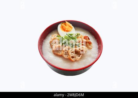 porridge di congee con fetta di pollo, tofu, uovo. porridge di congee da hong kong. cibo cinese Foto Stock