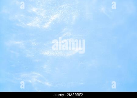 delicato sfondo blu con sequine onde movimento liquido Foto Stock