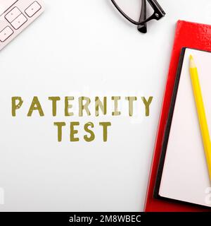 Didascalia di testo che presenta il test di paternità. Parola per un test di DNA per determinare se un dato uomo è il padre biologico Foto Stock
