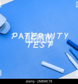 Didascalia di testo che presenta il test di paternità. Business Concept un test del DNA per determinare se un dato uomo è il padre biologico Foto Stock