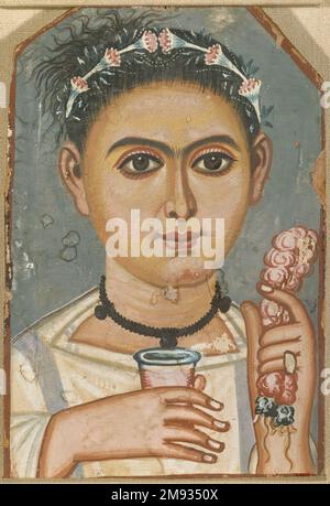 Ragazzo con una ghirlanda floreale nel suo Pittore Brooklyn per capelli (Fayum attivo, Egitto, A.D. 200-A.D.250). Ragazzo con una ghirlanda floreale nei suoi capelli, ca. 200-230 C.E. Legno (tiglio europeo - Tilia europaea, tiglio), tempera, 11 3/4 x 7 13/16 x 3/8 pollici (29,9 x 19,8 x 0,9 cm). Egiziano, classico, antico vicino Oriente arte ca. 200-230 C.E. Foto Stock