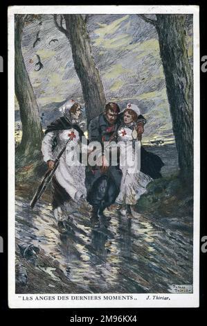 Due infermieri che sostengono un uomo ferito durante la prima guerra mondiale. Foto Stock