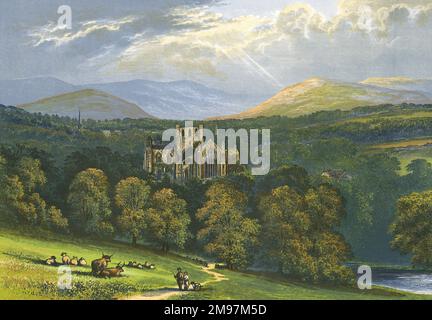 Vista sulle rovine di Melrose Abbey (cistercense), in Roxburghshire, Scozia. Foto Stock