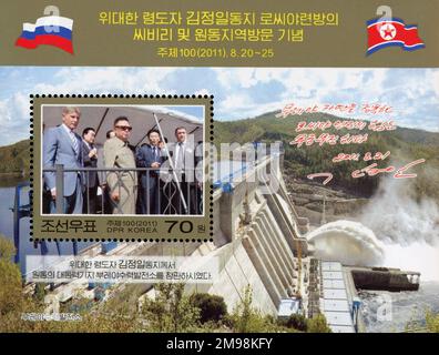 2011 timbro della Corea del Nord. Visita di Kim Jong il nelle regioni dell'Estremo Oriente della Russia. Centrale idroelettrica di Bureya Foto Stock