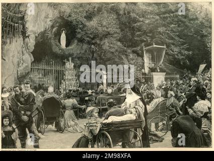 Di fronte al pozzo della tomba a Lourdes, Francia. Foto Stock