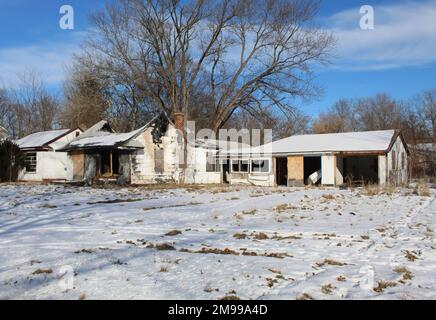 Tre case abbandonate in inverno a Brightmoor a Detroit Foto Stock