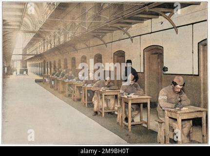 Prigione di Wandsworth, costruita nel 1851 e originariamente chiamata Surrey House of Correction. I detenuti scrivendo lettere. Foto Stock