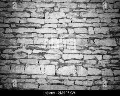 Muro pietra nero bianco mattone casa mattoni sfondo brezza blocchi texture pietre Foto Stock