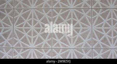 pavimento piastrellato sfondo floreale senza cuciture con fiori e foglie in pietra di forma geometrica Foto Stock