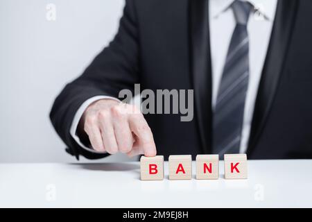 Blocchi di legno con banca di parola, concetto di banca di credito di prestito di affari Foto Stock