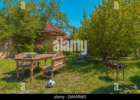 Area picnic in una casa di campagna Foto Stock