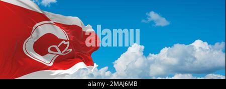 Bandiera ufficiale di Calgary, Alberta Canada su sfondo cielo nuvoloso al tramonto, vista panoramica. Viaggio canadese e concetto patriota. spazio di copia per ampio Foto Stock