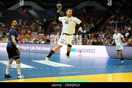 Kattowitz, Polonia. 19th Jan, 2023. Pallamano: Coppa del mondo, Germania - Argentina, Main Round, Gruppo 3, Giornata 1 allo Spodek Katowice. Jannik Kohlbacher (M) dalla Germania in azione. Credit: Jan Woitas/dpa/Alamy Live News Foto Stock