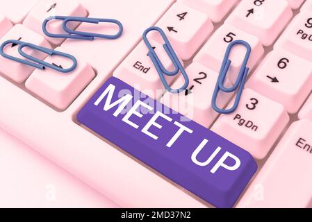 Cartello con la scritta Meet Up. Parola per riunione informale riunione di lavoro di squadra collaborazione di gruppo di discussione Foto Stock