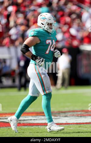 Miami Dolphins offensive tackle Liam Eichenberg (74) and offensive tackle Robert  Hunt (68) walk onto the field during the second half of an NFL football  game against the New York Jets, Sunday