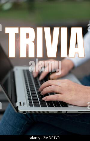 Didascalia concettuale Trivia. Parola scritta su considerazioni dettagli pezzi informazioni poca importanza o valore Foto Stock