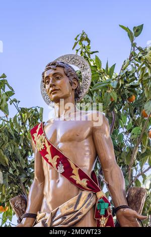 Particolare del Patrono San Sebastiano (San Sebastiano) in processione per le strade della città di Huelva Foto Stock