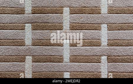 Sfondo di moquette a righe marrone e grigio. Foto Stock