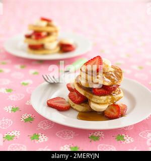 Pancake, fragole e sciroppo Foto Stock