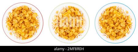 Ciotola di cornflakes dolci con latte isolato su sfondo bianco, vista dall'alto Foto Stock