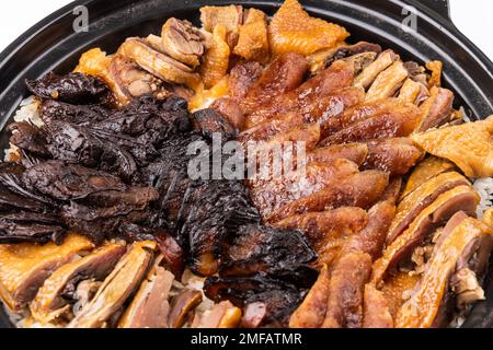 Primo piano su Lap mei fan o riso di carne waxed. E' un piatto tradizionale Cinese che viene servito durante le feste di Capodanno Cinese Foto Stock