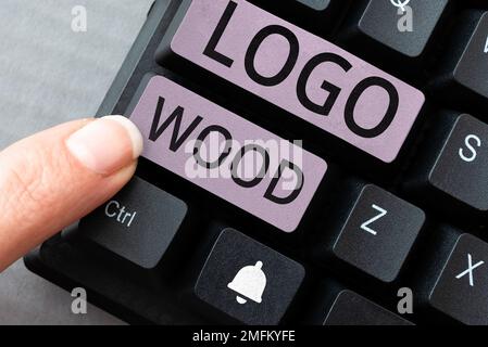 Testo che mostra il legno del logo di ispirazione. Parola scritta su disegno riconoscibile o simbolo di un'azienda inscritta su legno Foto Stock