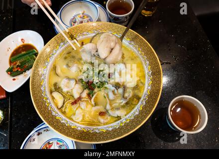 Zuppa di pesce in salsa Sichuan, Hong Kong Foto Stock
