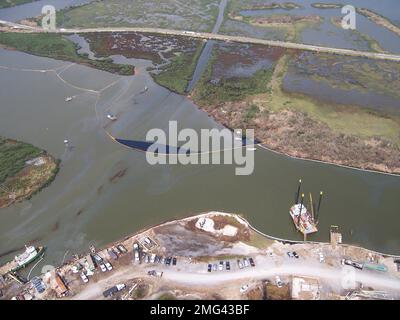 Overflight - Potter - Port Fourchon - 26-HK-210-2. Lat/Long: 29 06,378N, 90 12,108W; recupero di una fuoriuscita di petrolio non scavata. Uragano Katrina Foto Stock