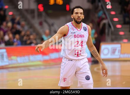 Bonn, Germania. 25th Jan, 2023. Basketball Champions League, Round of 16, Telekom cestini Bonn vs Bahcesehir College Istanbul, Deane Williams (Bonn) gesti. Credit: Juergen Schwarz/Alamy Live News Foto Stock