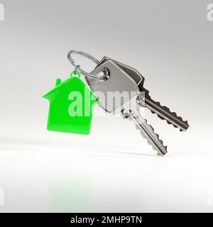 I tasti con una casa pendente. Foto Stock