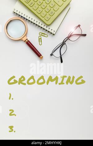 Didascalia di testo che presenta Grooming. Panoramica aziendale igiene e miglioramento dell'aspetto degli animali domestici Foto Stock