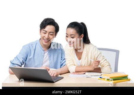 Giovani uomini e donne imparano insieme Foto Stock